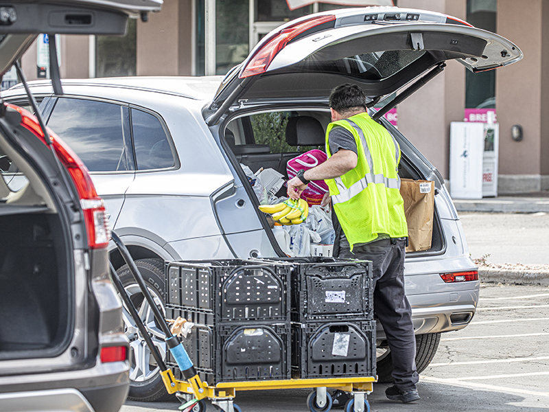 loading groceries into the car